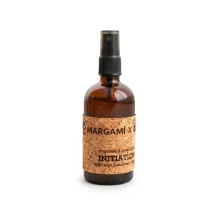 Margami Initiation Spray in an eco-friendly amber glass bottle with a cork label